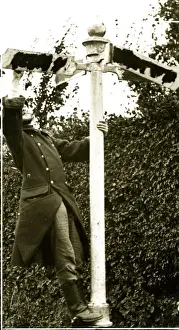 Hide Prints: Retreating Belgian soldier obliterating signpost names