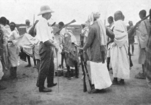 Richard Corfield distributing arms at Burao Fort Richard Corfield distributing arms at Burao Fort