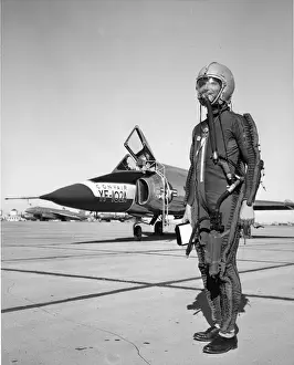 102a Prints: Richard L Johnson dressed in an Air Force T-1 pressure suit