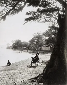 Rickshaw on beach, Honmuku, Yokohama, Japan