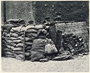 Sandbags Prints: With rifles levelled ready for action