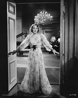 Dear Prints: Rita Johnson wearing an evening gown designed by Dolly Tree