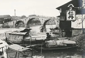 River boats and bridge, China