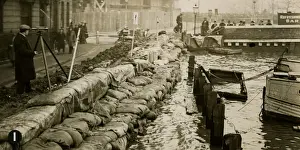 Sandbags Prints: River Thames flooding at high tide, London