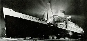 Awaiting Prints: RMS Queen Mary bathed in floodlight before launch