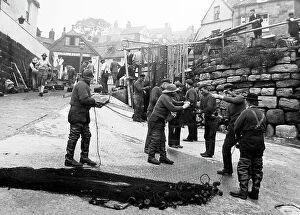 Nets Collection: Robin Hoods bay repairing the nets