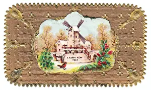 Robin and windmill in the snow on a New Year card