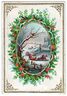 Robins, holly and snow scene on a Christmas card