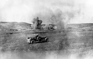 Battle Field Gallery: Rolls Royce armoured car being shelled, WW1