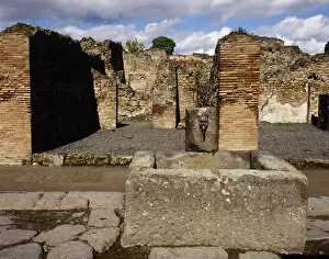 Abundance Gallery: Roman art. Pompeii. Public fountain. Abundance path. Italy