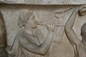 Roman Art. Woman Playing double flute