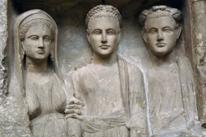 Roman funerary stele with high relief of three figures. 1st Roman funerary stele with high relief of three figures. 1st