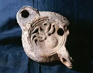 Terracotta Collection: Roman oil lamps. Terracotte. Octopus decoration. From Catalo