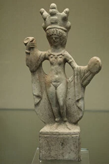 Aphrodite Collection: Roman statuette of Venus holding a mirror. 2nd century AD