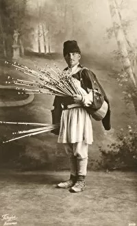 Images Dated 23rd March 2011: Romanian man with bunch of thin sticks