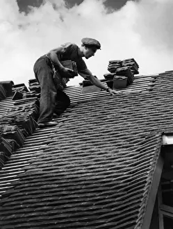 Roof Tiler Lays Slates