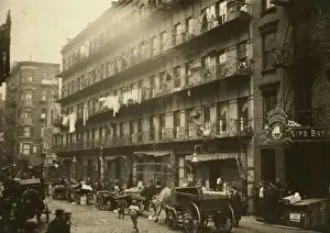 Row of tenements, 260 to 268 Elizabeth St. NY, in which a g