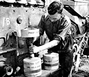 Armoured Prints: Royal Engineer adjusting a Flying Dustbin charge; Second W