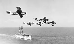 Biplanes Prints: Royal Navy Aircraft Carrier and biplanes possibly 1920s