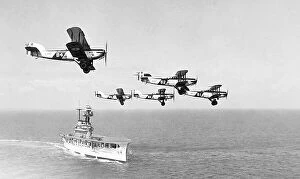 Aviator Collection: Royal Navy Aircraft Carrier and biplanes possibly 1920s