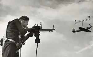 A Royal-Navy Fleet Air Arm Air Gunner Practices at a Sho?