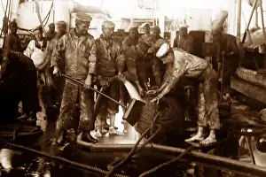 Royal Navy sailors tarring rope - Victorian period