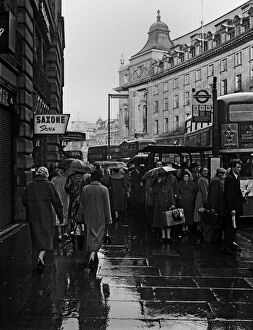 Umbrellas Collection: Rush hour in Regent Street, London
