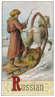 Russian man driving horse-drawn sleigh