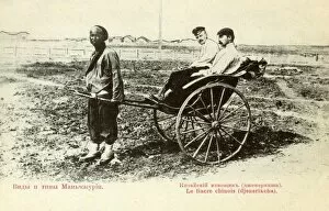 Russian men travelling by rickshaw in Manchuria