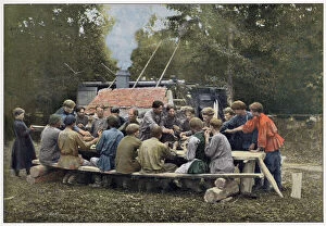 Images Dated 30th March 2021: Russian workers taking their communal meal out in the open air Date: 1890s