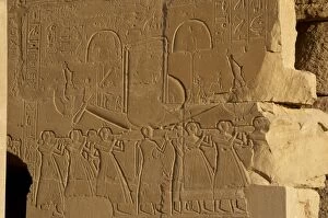 Theban Collection: Sacred solar boat carried by priests. Relief. Ramesseum. Egy