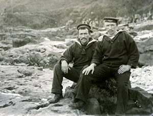 Images Dated 27th September 2019: Two sailors sitting on coastal rocks