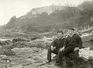 Images Dated 27th September 2019: Two sailors sitting on coastal rocks