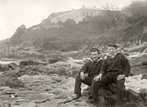 Images Dated 27th September 2019: Two sailors sitting on coastal rocks