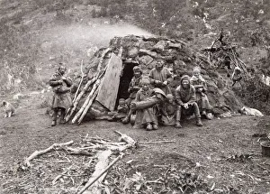Sami family outside their home, Norway