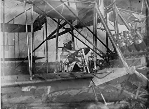 Samuel Franklin Cody at the wheel of a 1909 biplane