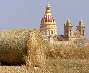 San Lawrenz church with hay bales