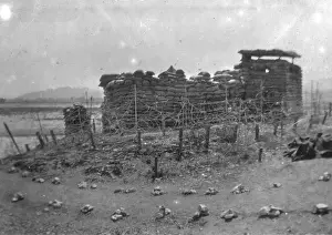 Dusty Prints: Sandbags and barbed wire, India