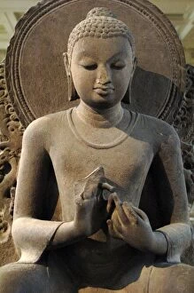 Pradesh Gallery: Sandstone figure of the seated Buddha. 5th century. Sarnath