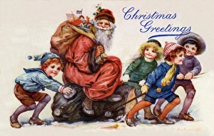 Images Dated 20th July 2011: Santa on yule log with children