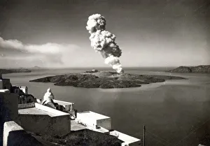 Images Dated 3rd July 2020: Santorini, Greece - view across the volcano crater, with smoke issuing from the centre
