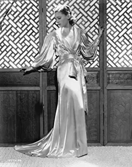 A satin negligee designed by Dolly Tree for Ann Morriss