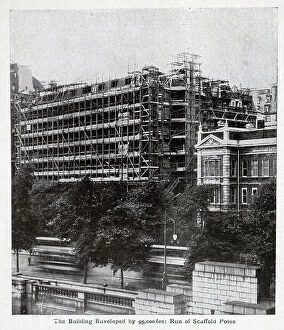 Extension Collection: Savoy Hotel in scaffolding, captioned The Building Enveloped by 95, 000 feet Run of Scaffold Poles'