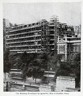 Savoy Hotel in scaffolding, captioned The Building Enveloped by 95, 000 feet Run of Scaffold Poles'. From an article The Savoy Extension: A World Record by George R Sims