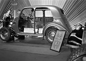 Stripped Prints: Scene in a car showroom