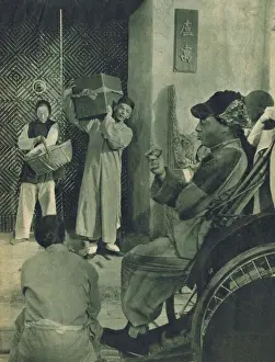 A scene from The Good Earth (1937) with Luise Rainer