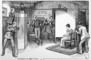 Assistants Prints: Scene in a photographers studio, example of portrait making