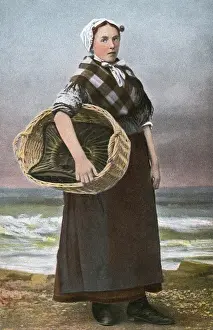 Scheveningen, The Netherlands: Fishwife holding a basket