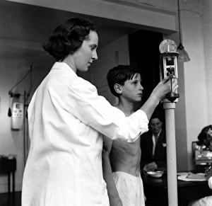 Images Dated 1st March 2012: School / Weighing Pupil
