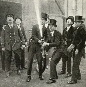 Schoolboys practising hose drill, Eton School, Berkshire